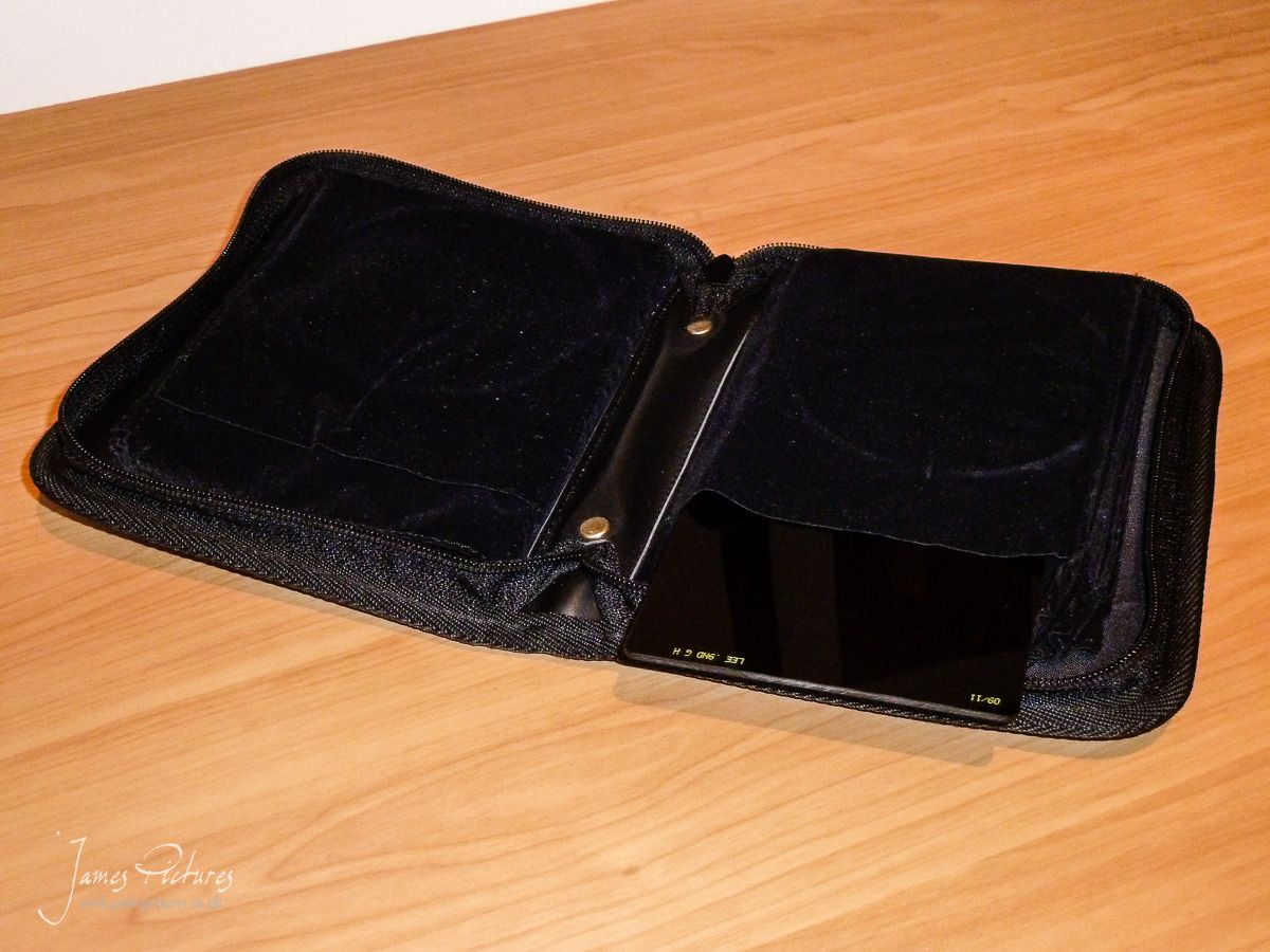 This is the Lee 10 Filter Holder open on its centre page with a filter introduced into the sleeve.