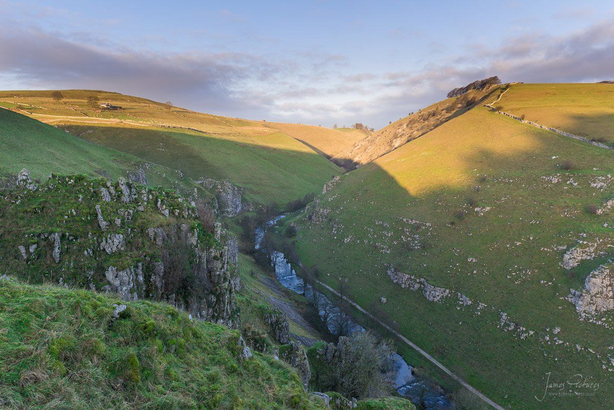 Sunrise from Drabber Tor looking North up Wolfscote Dale and the River Dove.