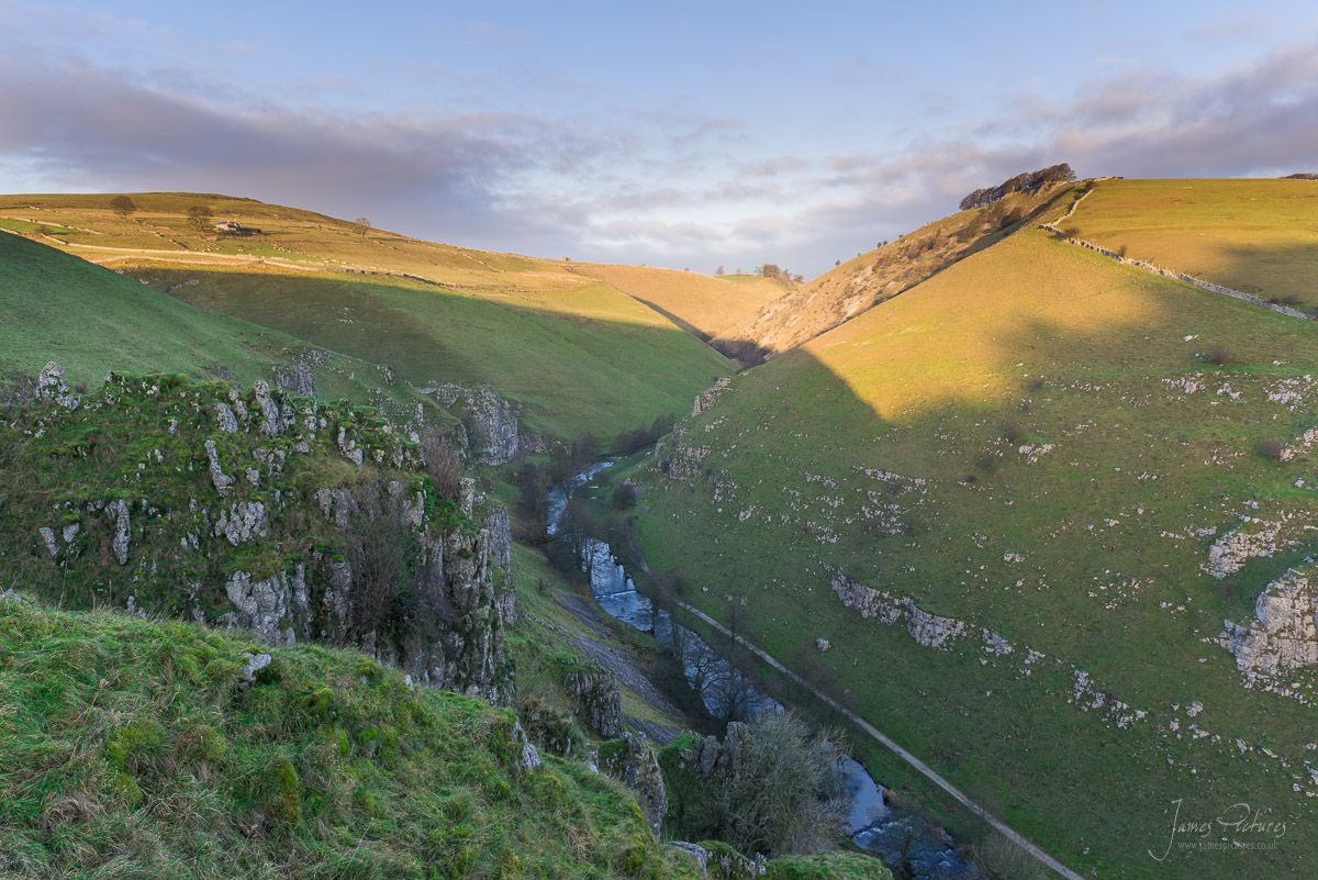 Sunrise from Drabber Tor looking North up Wolfscote Dale and the River Dove.
