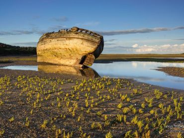 One of the stranded boats in Dulas Bay, North Wales with some fabulous front lighting as the sun starts to set behind me.