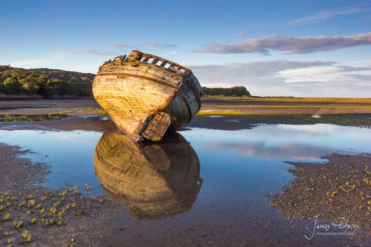 I have no idea how old this old boat is, but it fascinates me, wondering where it has been and how it came to rest here.