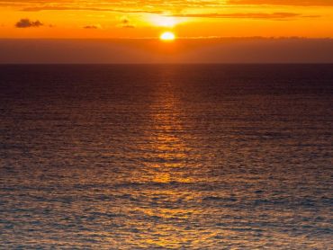 Taken on Llanddwyn Island, once the light faded some what I couldnt resist this shot of the sun going over the horizon. Stunning to witness!