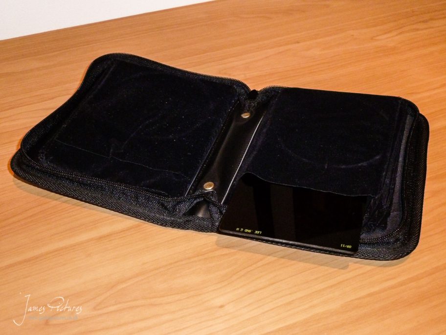 This is the Lee 10 Filter Holder open on its centre page with a filter introduced into the sleeve.