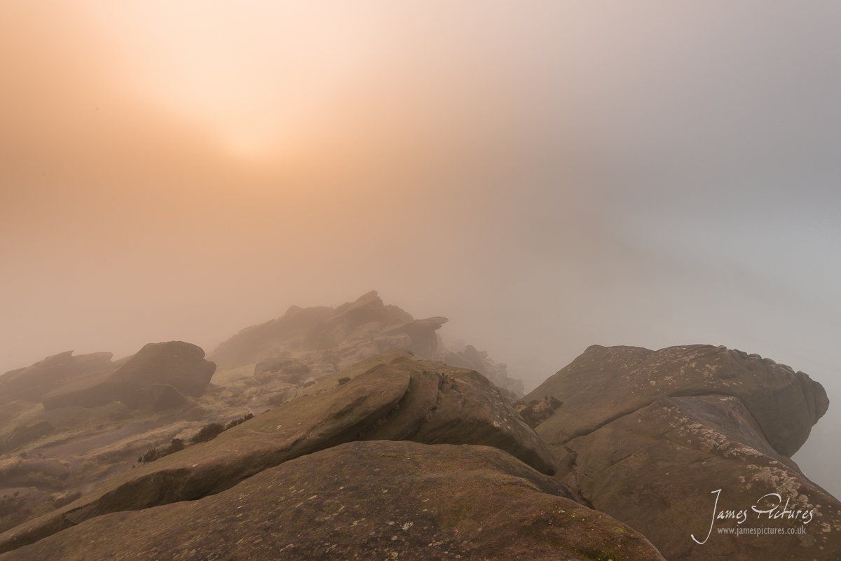 The sun trying to break though The Roaches sun breaking through the mist