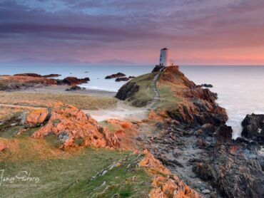 The stunning Llanddwyn Island Lighthouse at sunset. Llanddwyn Island is one of those places that you must visit if coming to wales, its views are speechless and breathtaking.