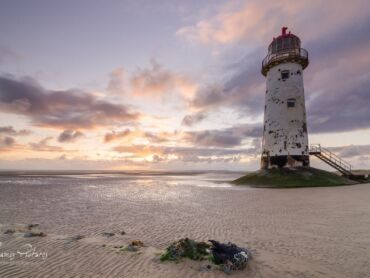 Point of Ayr Lighthouse can be found on Talacre Beach, Flintshire, North Wales.